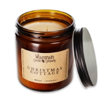 The Christmas Cottage 16 oz Candle with the lid open