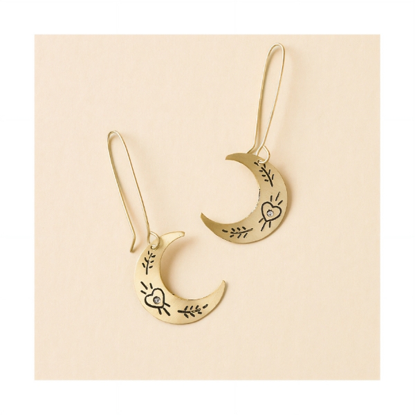 The Ruchi Crescent Moon Dangle Earrings - Gold outside of its packaging, on its own