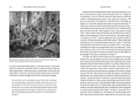 Page spread from "Red Arrow Across the Pacific" with black and white photo of soldiers taking a break in woodsy setting in Saidor. Paragraphs of text on right. 