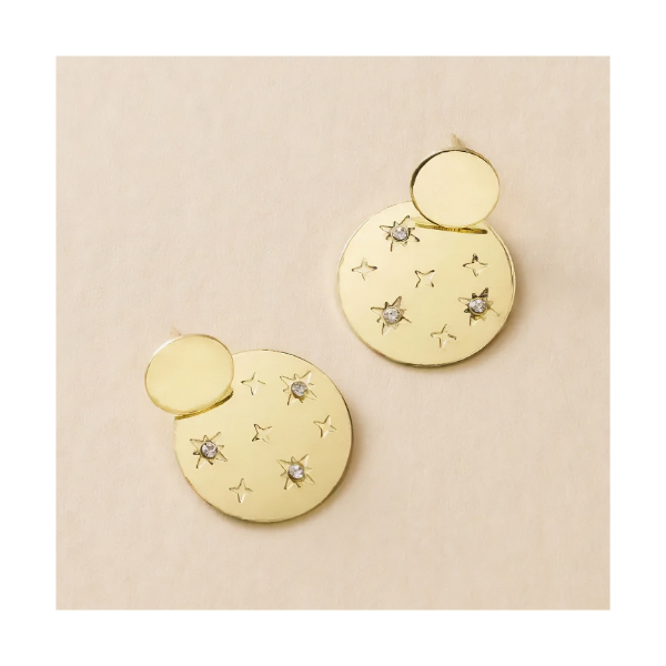 The Sitara Starry Double Circle Dangle Earrings - Gold out of its packaging