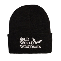 Charcoal gray knit cap that says Old World Wisconsin in white embroidery.