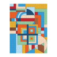 Frank Lloyd Wright "December Gifts" puzzle, assembled, with colorful geometric design.