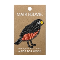 A lapel pin in the form of an American robin made with colored beads. Shown mounted on display card.