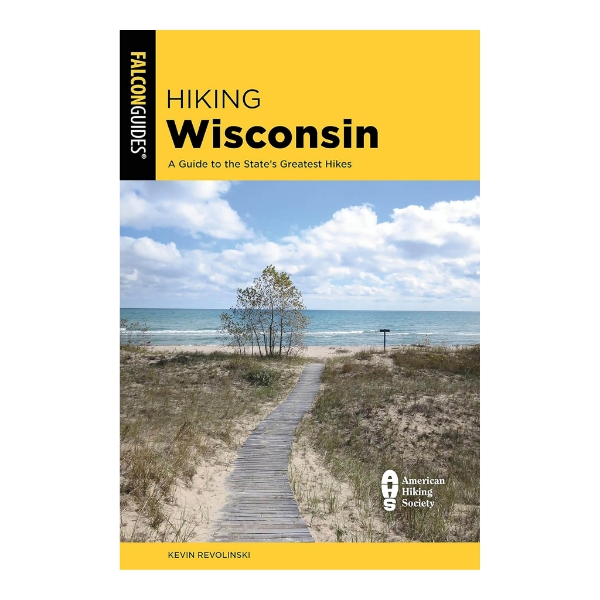 Book cover of "Hiking Wisconsin" with color photo of a boardwalk leading to a lake on a summery day.