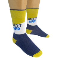 The blue, yellow and white Best Dad Ever Socks worn on someone's feet. 